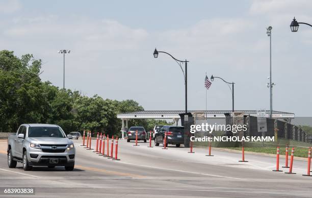 Cars enter and exit US Army facility Fort Leavenworth in Leavenworth, Kansas, on May 16, 2017. After seven years behind bars, US Army Private Chelsea...