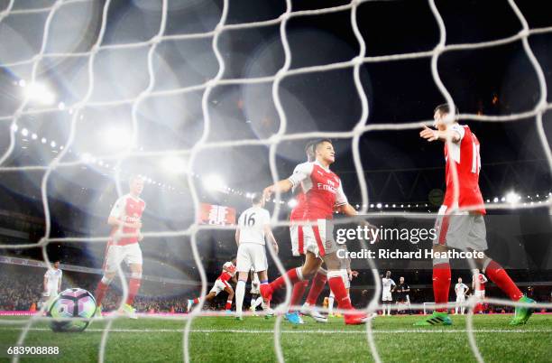 Alexis Sanchez of Arsenal celebrates scoring his sides second goal with Mesut Ozil of Arsenal during the Premier League match between Arsenal and...