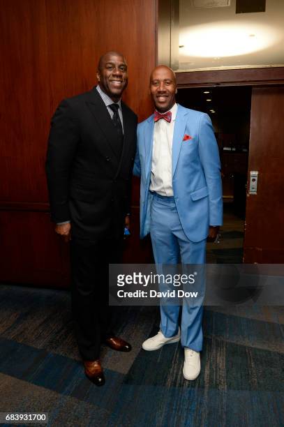 Bruce Bowen and Magic Johnson smile during the 2017 NBA Draft Lottery at the New York Hilton in New York, New York. NOTE TO USER: User expressly...