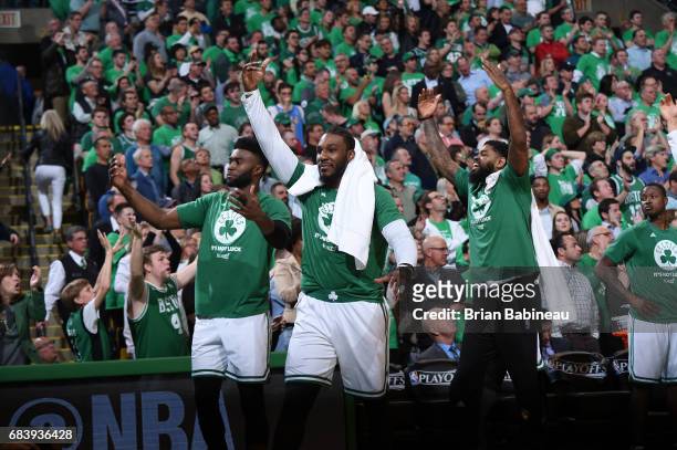 Jaylen Brown, Jae Crowder, and Amir Johnson of the Boston Celtics celebrate during Game Seven of the Eastern Conference Semifinals of the 2017 NBA...
