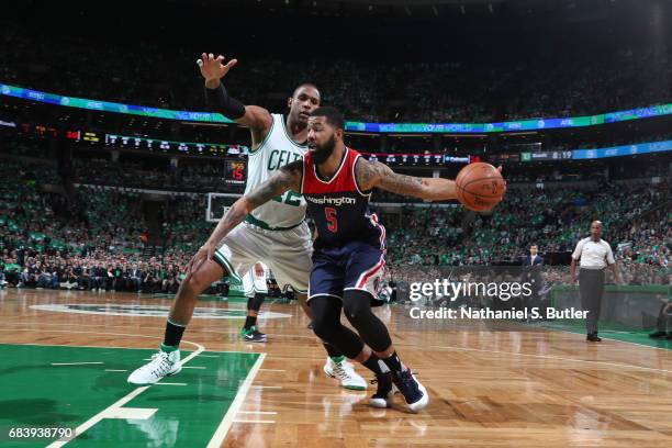 Markieff Morris of the Washington Wizards handles the ball against Al Horford of the Boston Celtics during Game Seven of the Eastern Conference...