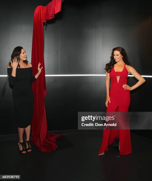 Megan Gale sees her was figure for the first time at Madame Tussauds Sydney on May 17, 2017 in Sydney, Australia.