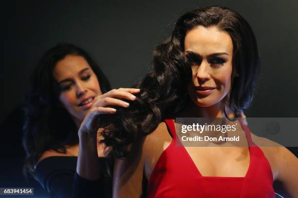 Megan Gale inspects her wax figure at Madame Tussauds Sydney on May 17, 2017 in Sydney, Australia.