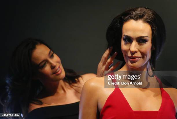 Megan Gale inspects her wax figure at Madame Tussauds Sydney on May 17, 2017 in Sydney, Australia.