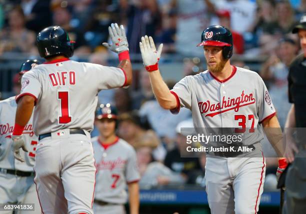 Stephen Strasburg of the Washington Nationals and Wilmer Difo celebrates after a two run home run in the fourth inning against the Pittsburgh Pirates...