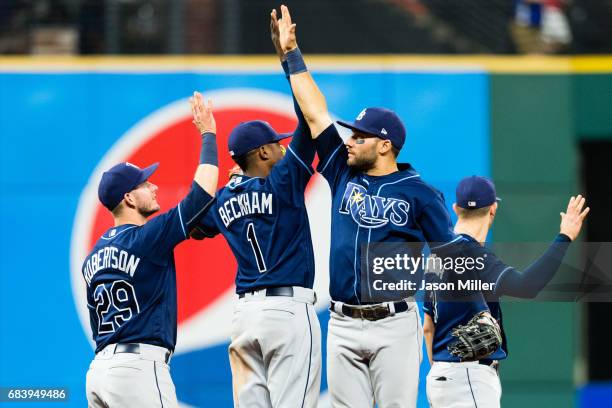 Daniel Robertson Tim Beckham Kevin Kiermaier and Evan Longoria of the Tampa Bay Rays celebrate after the Rays defeated the Cleveland Indians at...