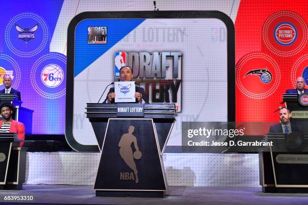 Deputy Commissioner of the NBA, Mark Tatum announces the Charlotte Hornets 11th pick during the 2017 NBA Draft Lottery at the New York Hilton in New...