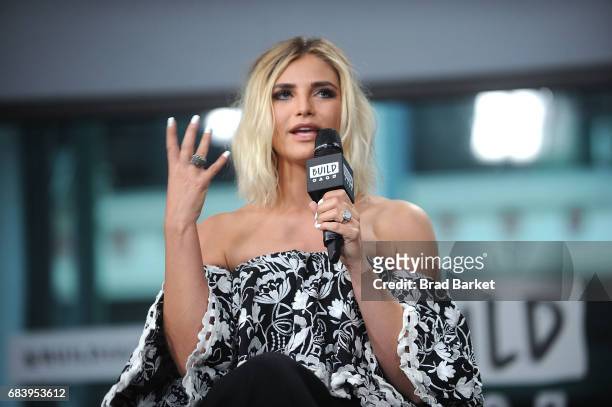 Olivia Caridi discusses the "Bachelorette" with the "Here To Make Friends" Podcast at Build Studio on May 16, 2017 in New York City.
