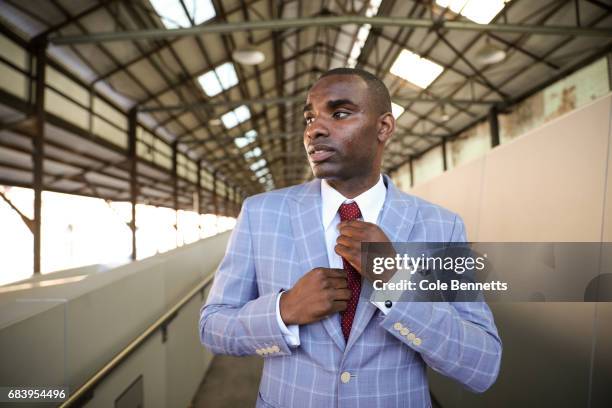 Preston Pollard wearing Benjaman Barker suit and Esquire tie with Zara shoes during Mercedes-Benz Fashion Week Resort 18 Collections at Carriageworks...