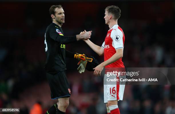 Petr Cech of Arsenal and Rob Holding of Arsenal during the Premier League match between Arsenal and Sunderland at Emirates Stadium on May 16, 2017 in...