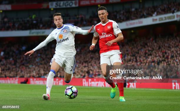 Billy Jones of Sunderland and Kieran Gibbs of Arsenal during the Premier League match between Arsenal and Sunderland at Emirates Stadium on May 16,...