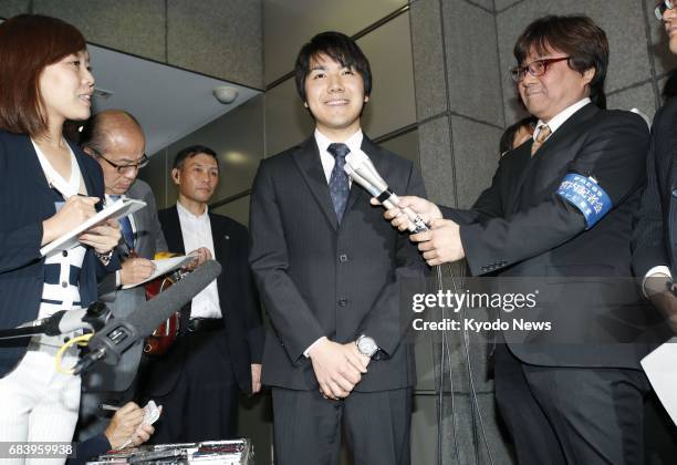 Kei Komuro, who will soon become engaged to Princess Mako, the first grandchild of Emperor Akihito, speaks to reporters in Tokyo on May 17, 2017....