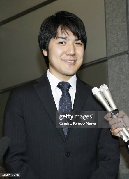 Kei Komuro, who will soon become engaged to Princess Mako, the first grandchild of Emperor Akihito, speaks to reporters in Tokyo on May 17, 2017....