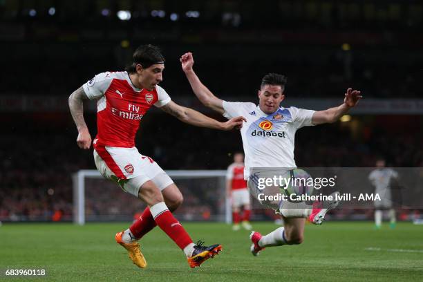 Hector Bellerin of Arsenal and Bryan Oviedo of Sunderland during the Premier League match between Arsenal and Sunderland at Emirates Stadium on May...