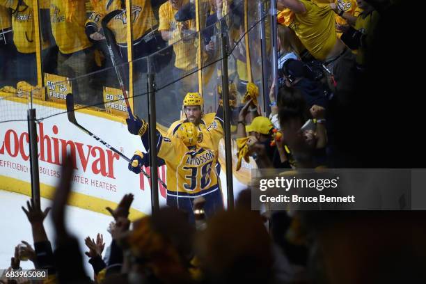 Roman Josi of the Nashville Predators celebrates with Viktor Arvidsson after scoring a goal against John Gibson of the Anaheim Ducks during the third...