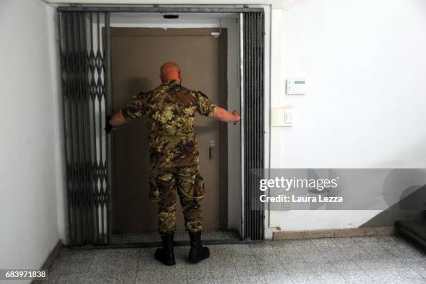 Military officer enters the vault where the pack of cannabis produced by the Italian Army at Stabilimento Chimico Farmaceutico Militare and ready to...