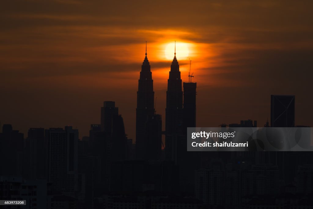 Dramatic sunset in downtown Kuala Lumpur, Malaysia