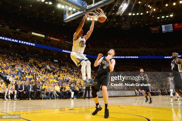 James Michael McAdoo of the Golden State Warriors dunks the ball during the game against the San Antonio Spurs during Game Two of the Western...
