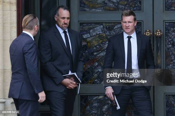 Magpies head coach Nathan Buckley and asisstat coach Anthony Rocca leave the Lou Richards State Funeral Service at St Paul's Cathedral on May 17,...
