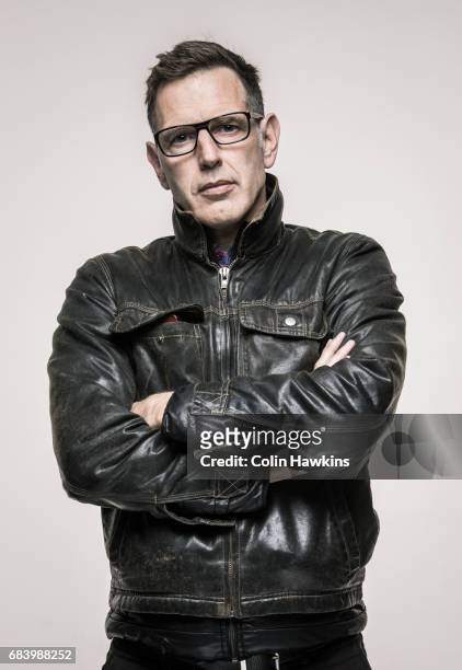 man with crossed arms and attitude - leather jacket stock-fotos und bilder