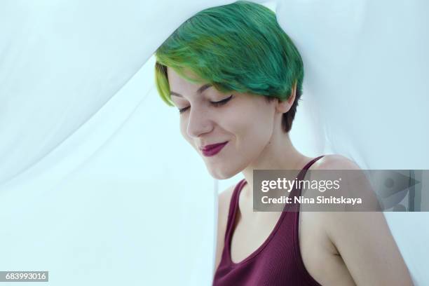 smiling woman with green hair under the veil - green hair stock pictures, royalty-free photos & images
