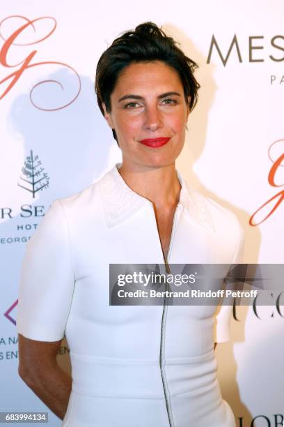 Alessandra Sublet attends the "Global Gift, the Eva Foundation" Gala : Photocall at Hotel George V on May 16, 2017 in Paris, France.