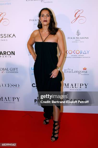 Actress Elisa Tovati attends the "Global Gift, the Eva Foundation" Gala : Photocall at Hotel George V on May 16, 2017 in Paris, France.