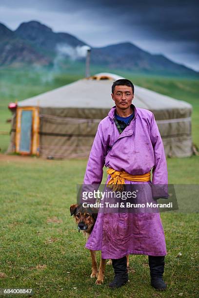 mongolia, nomad man and dog - mongolsk kultur bildbanksfoton och bilder