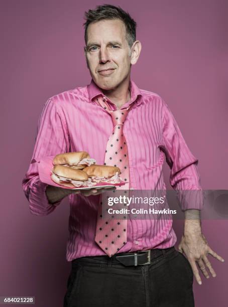 office worker with sandwiches - happy man pink background stock pictures, royalty-free photos & images