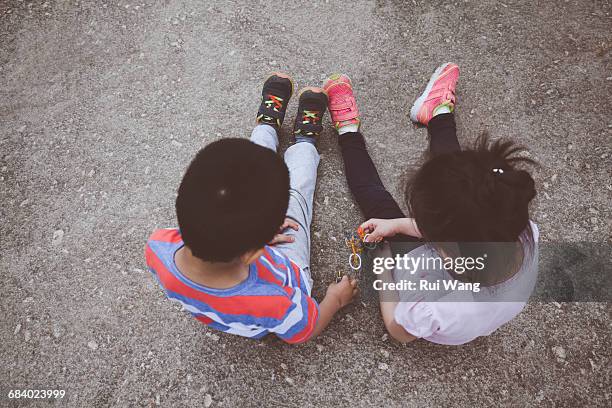 Young boy and girl playing together