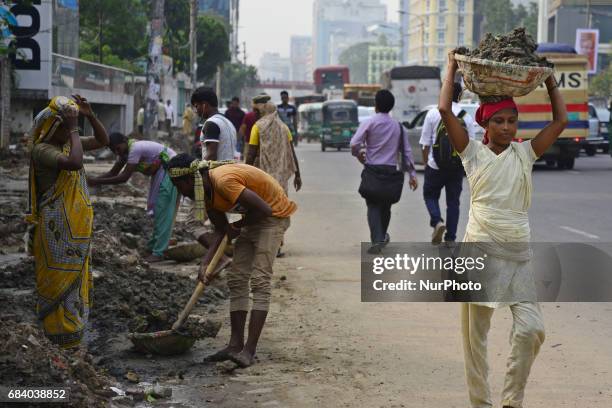 Bangladeshi labors works road repairing in Dhaka Capital City, Bangladesh. On May 16, 2017