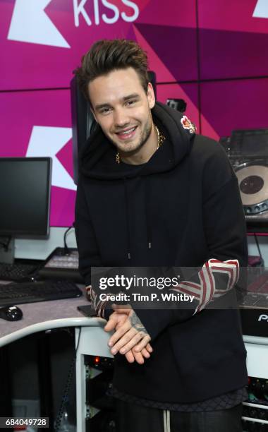 Liam Payne poses for a photo during a visit to Kiss at Golden Sqaure on May 2, 2017 in London, England.