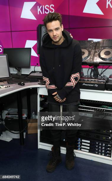 Liam Payne poses for a photo during a visit to Kiss at Golden Sqaure on May 2, 2017 in London, England.