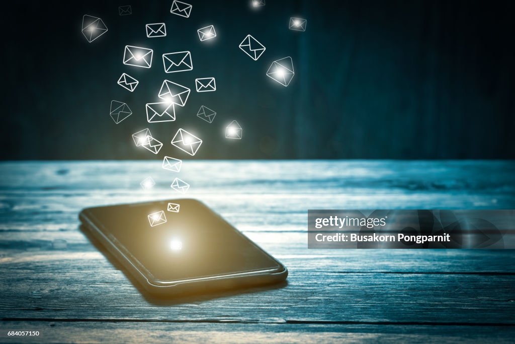 Email marketing and many envelopes in smartphone screen