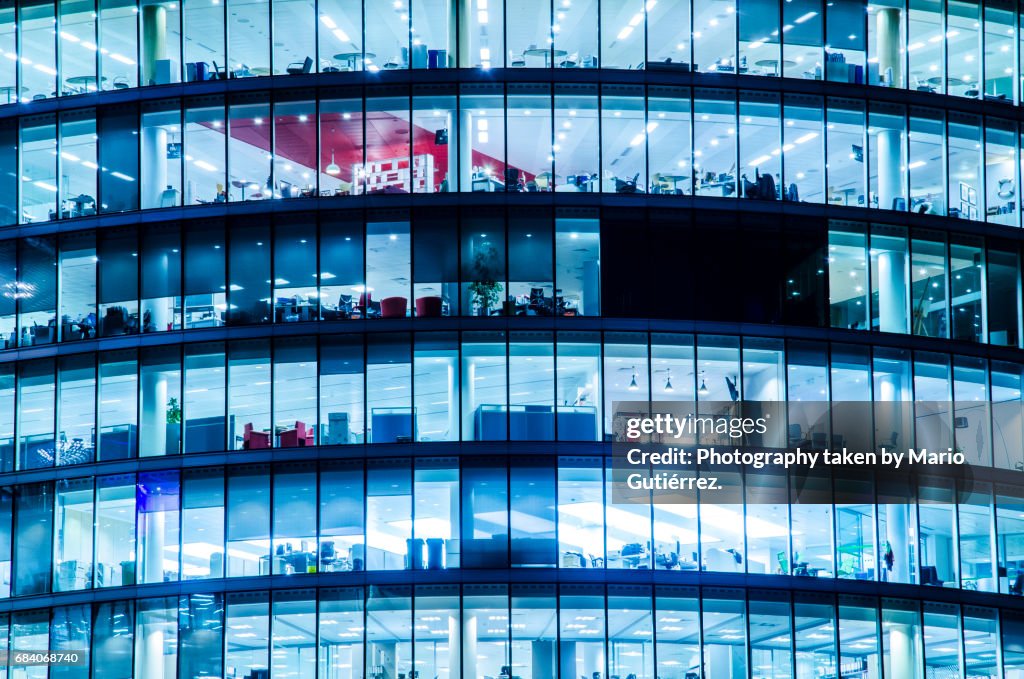 Office building facade at night