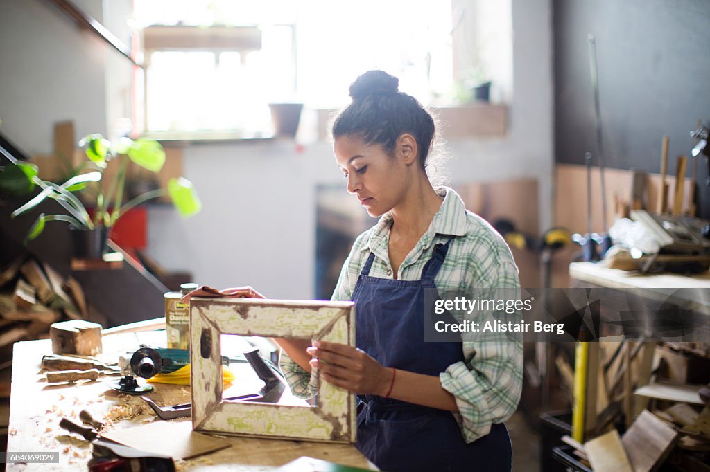 Craftswoman working in her workshop