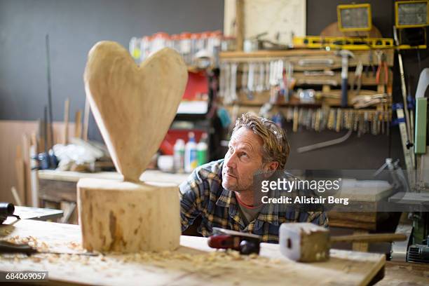 craftsman working in his workshop - carving sculpture stock pictures, royalty-free photos & images