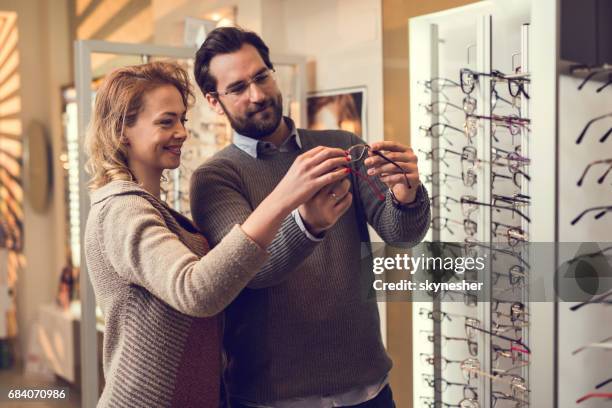 what do you think about these eyeglasses honey? - choosing eyeglasses stock pictures, royalty-free photos & images