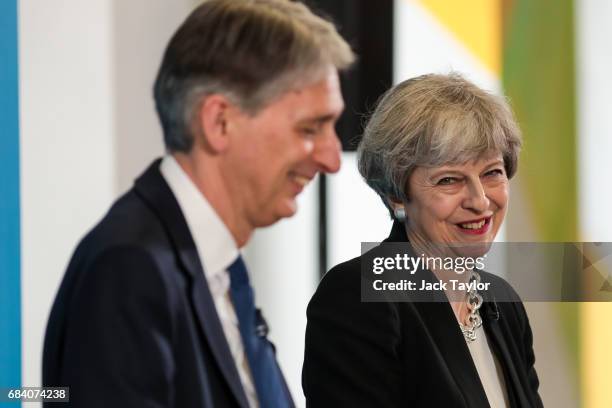 British Prime Minister Theresa May and Chancellor of the Exchequer Philip Hammond hold a Conservative Party Press Conference at One Canada Square on...