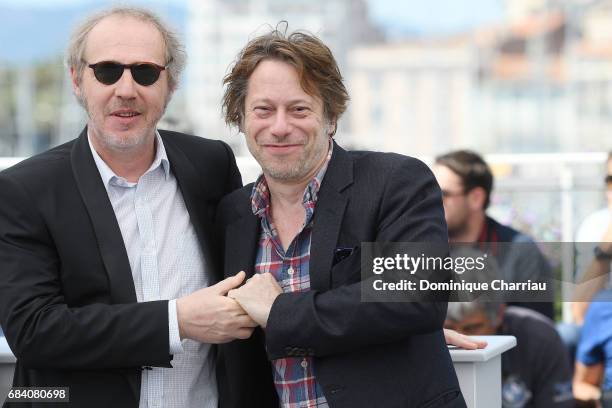 Director Arnaud Desplechin and actor Mathieu Amalric attend the "Ismael's Ghosts " photocall during the 70th annual Cannes Film Festival at Palais...