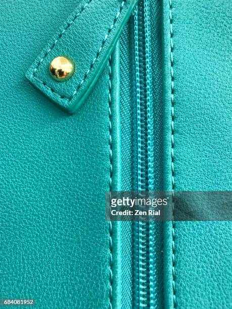 close-up of purse zipper in turquoise color - blue purse fotografías e imágenes de stock
