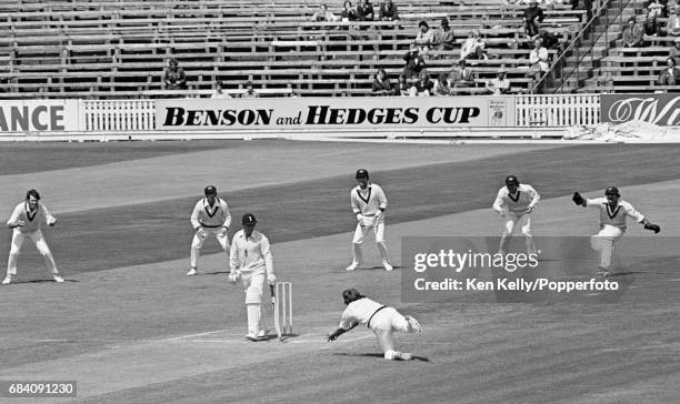 England batsman Dennis Amiss is caught by Australian substitute fielder Gary Gilmour for 5 runs in the 1st Test match between England and Australia...