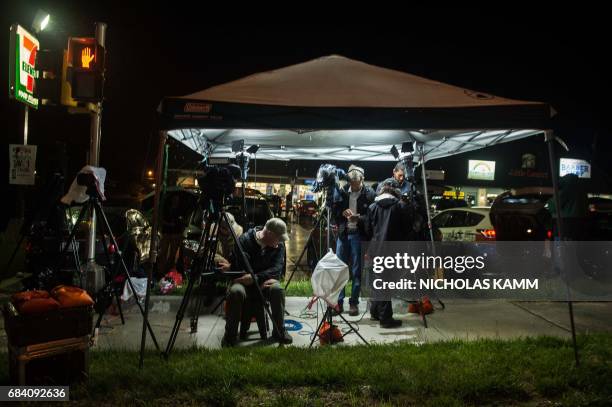 Media crews wait outside US Army facility Fort Leavenworth in Leavenworth, Kansas, before dawn on May 17, 2017. After seven years behind bars, US...