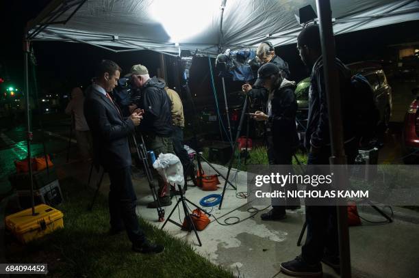 Media crews wait outside US Army facility Fort Leavenworth in Leavenworth, Kansas, before dawn on May 17, 2017. After seven years behind bars, US...