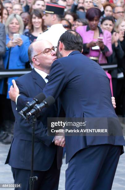 France's newly-appointed Prime Minister Edouard Philippe attends an official handover ceremony with outgoing Prime Minister Bernard Cazeneuve at the...