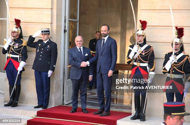 France's newly-appointed Prime Minister Edouard Philippe attends an official handover ceremony with outgoing Prime Minister Bernard Cazeneuve at the...