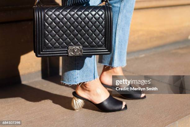 Personality and Creative Director and founder of DILLON DOT Jaime Ridge wearing H and M shoes and jeans and a Chanel bag during Mercedes-Benz Fashion...