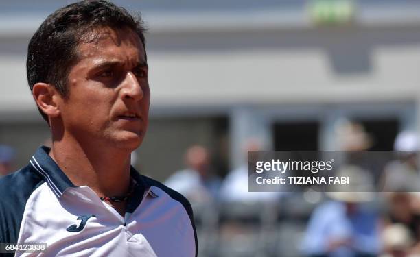 Nicolas Almagro of Spain looks on during his match against Rafael Nadal of Spain at the ATP Tennis Open tournament on May 17, 2017 at the Foro...