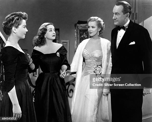 From left to right, Anne Baxter as Eve Harrington, Bette Davis as Margo Channing, Marilyn Monroe as Miss Casswell and George Sanders as Addison...
