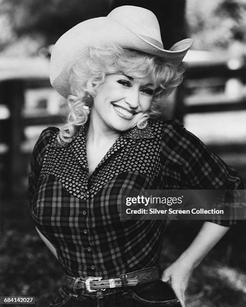 American actress, singer and songwriter Dolly Parton, circa 1975.